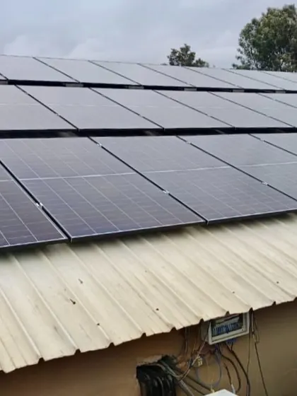 Another view of the 106 kWh solar installation on the hotel's metal-sheet rooftop. Our team is experienced in installing systems on various roof types, ensuring secure and efficient mounting.