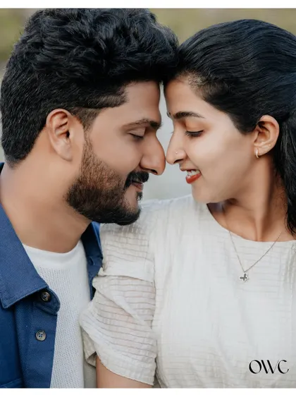 A close-up of a couple touching noses, a simple and sweet gesture of love captured during their lakeside pre-wedding shoot.