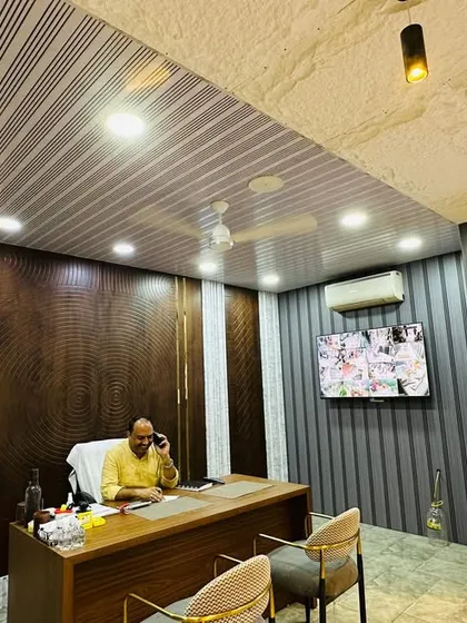 A wider view of my office, showcasing how different wall panels and ceiling designs can be used together to create a cohesive and luxurious look.