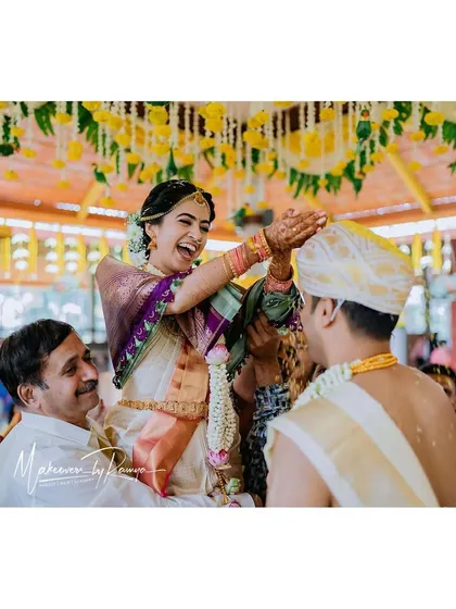 A joyful moment from Sharvari's wedding ceremony as she is lifted by her family.