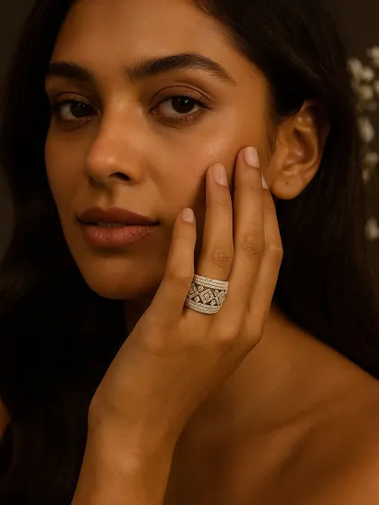 This wide band diamond ring is a statement of power, grace, and individuality. Made with precision and layered with brilliance, it is designed to capture every gaze.