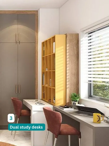 Dual study desks mean zero fights over homework time. This shared room includes a long, side-by-side study table with a shared bookshelf in the middle.