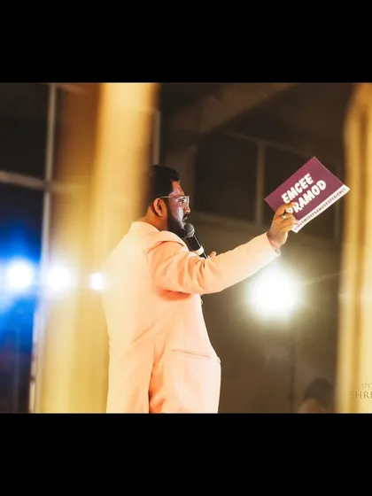 On stage, holding my placard high.