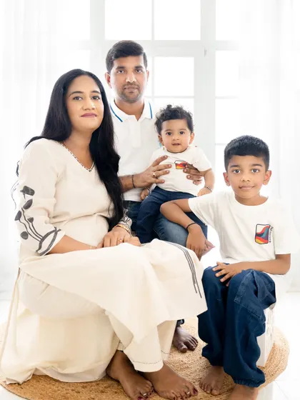A slightly different arrangement of the family portrait, creating a warm and connected feel.
