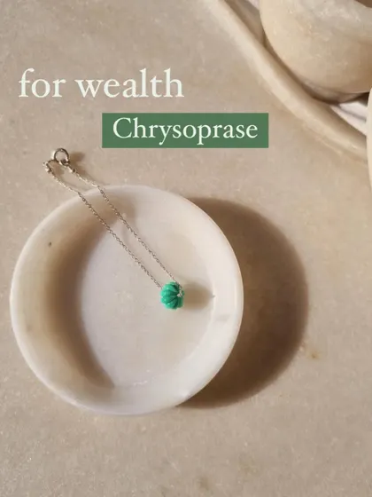Another view of the Chrysoprase melon charm bracelet. This stone promotes love of truth and is a powerful tool for attracting wealth.