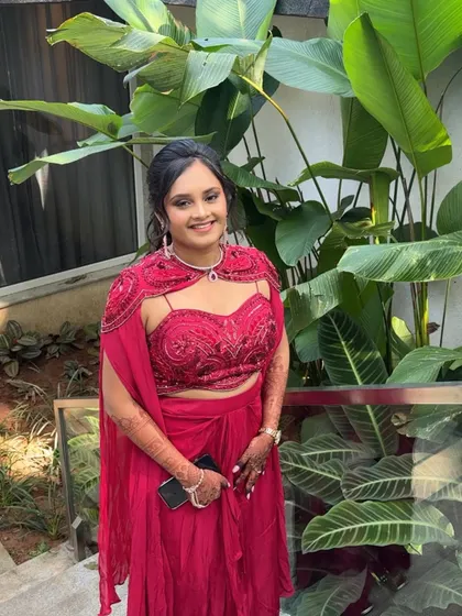 A full-length view of the welcome look, showing how the makeup, hair, and outfit come together perfectly.