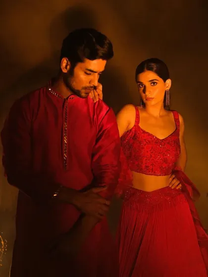 A romantic pose from the Nayantaara campaign. The makeup on the female model is soft yet defined, with a focus on the eyes, creating a captivating look.