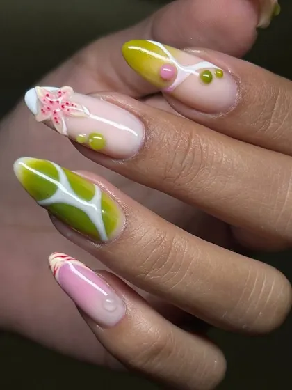 A whimsical, ocean-inspired nail art design. This set features 3D elements like a starfish, plus textures and colors that evoke a vibrant underwater scene.