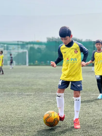 Thursday football fun. A young talent showcases their ball control during a practice session, a snapshot of the skills being developed every day on our field.