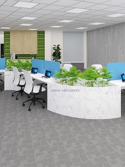 A duplicate of image 75, displaying an open-plan office with a central planter and ergonomic workstations.
