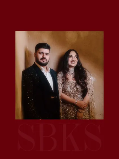 An elegant, framed portrait of a couple from their grand pre-wedding event, exuding class and sophistication.