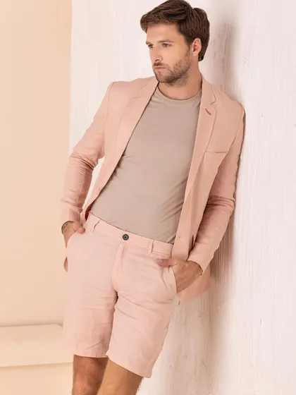 A chic summer look for a groom or wedding guest. I paired a pink linen blazer with matching shorts for a modern and stylish take on event dressing.