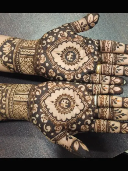 A full view of a gorgeous design featuring elephant motifs within a central mandala. This is a popular choice for its traditional symbolism and beauty.