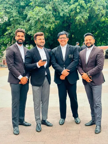 A happy moment with my team. We believe that a positive attitude is part of the path to success.