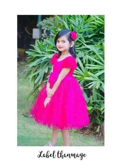 Another version of my popular Barbie frock, this one in a vibrant fuchsia with a matching hair clip.