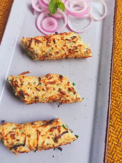 Spice up your cravings with my Murgh Mirch Pudina Seekh. This melt-in-your-mouth seekh kebab is made with minced chicken, fresh mint, and green chilies, then char-grilled in a clay oven.