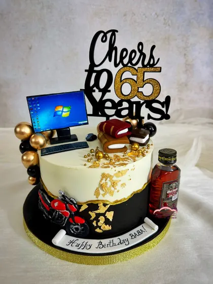 All of his favorite things! A 65th birthday cake for a dad who loves his computer, his bike, and a good drink.