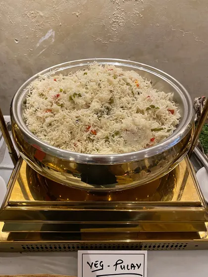 Our Veg Pulav is a fragrant rice dish cooked with assorted vegetables and mild spices. It serves as the perfect, light accompaniment to our rich and flavorful curries.