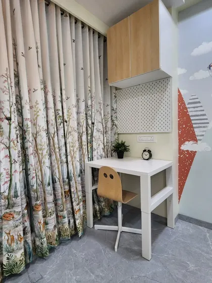A close-up of the compact study nook in the adventure room.