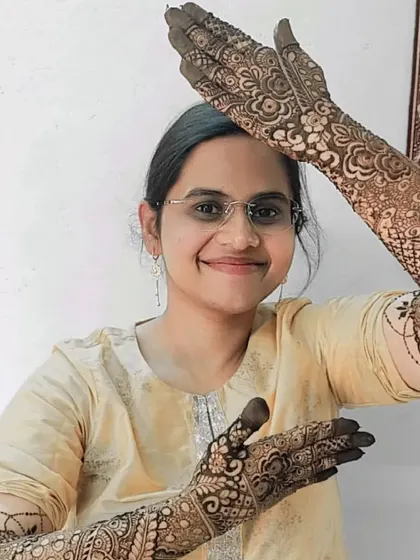 A happy client showing off her full bridal mehendi. Her joy is the reason I pour so much love and passion into my art.