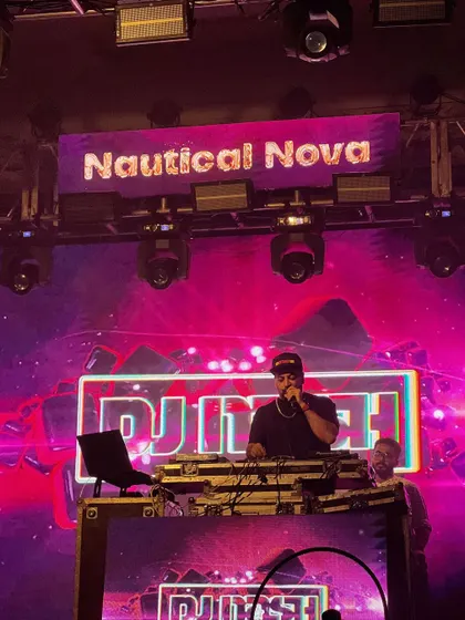 Hyping up the massive crowd at the 'Nautical Nova' college fest.