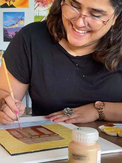 A guest enjoying our puzzle painting workshop. It's a great way to unwind and get creative, perfect for both beginners and experienced painters.