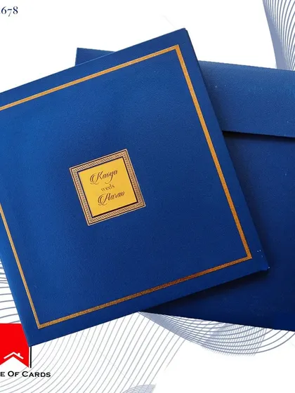This square invitation in royal blue and gold is a statement of pure luxury. The design is simple, allowing the rich color and metallic finish to shine.