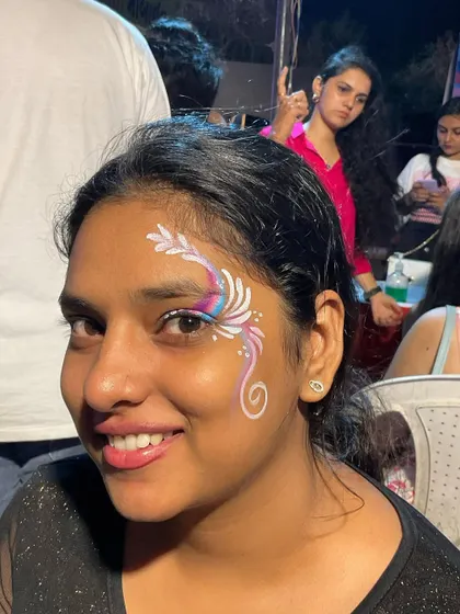 A beautiful abstract design using a rainbow split cake for a multi-color effect with a single brush stroke.