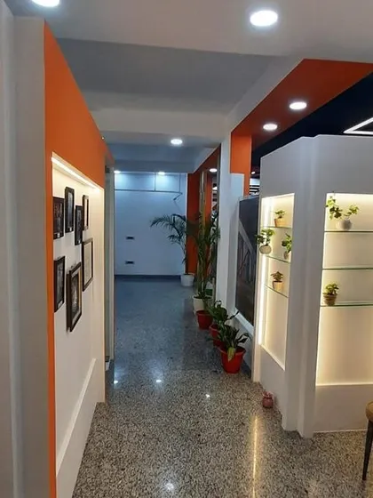 A view down the hallway of our Gulmohar Park branch. The space is designed to be clean, organized, and calming, with private treatment areas to ensure patient comfort and confidentiality.