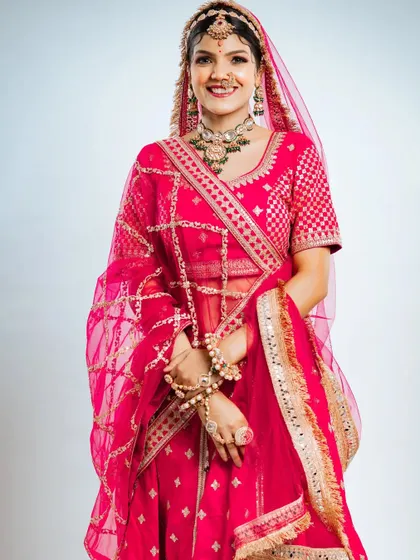A joyful, full-length shot that perfectly captures the spirit of a bride on her special day.