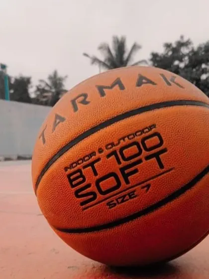 A close-up of the Tarmak basketball we use for our outdoor training. We provide quality equipment for all our practice drills and games.