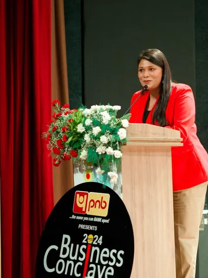 At the podium for the PNB-sponsored Business Conclave at SRCC, Delhi University. Hosting for prestigious institutions requires a blend of formal presentation and youthful energy.