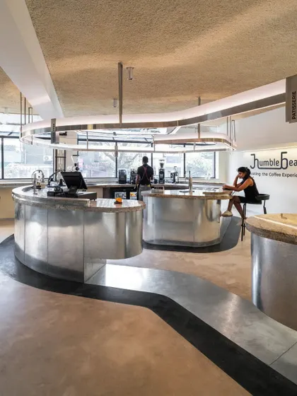 A final shot of the completed Humble Bean interior, a space that is both complex and harmonious.