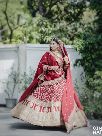 A joyful twirl from the bride, showcasing the flare of her lehenga. These dynamic shots add a sense of fun and celebration.