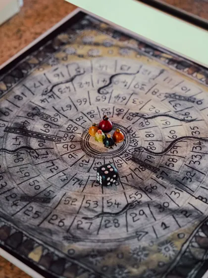 An ancient board game is ready for players. We love sharing these traditional games that have been enjoyed for generations.