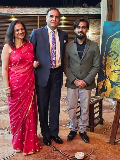With LT General Dhiraj Seth and his wife, standing beside the glitter portrait I created for him. This piece was a tribute to his service in the Indian Army.