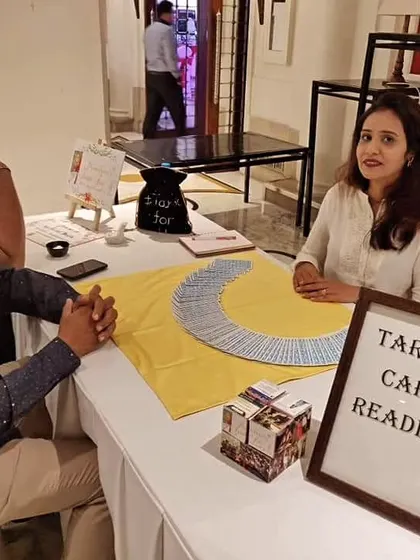 A throwback to one of my tarot reading setups at an event. The simple act of fanning the cards is an invitation for clients to explore their questions and find the guidance they seek.