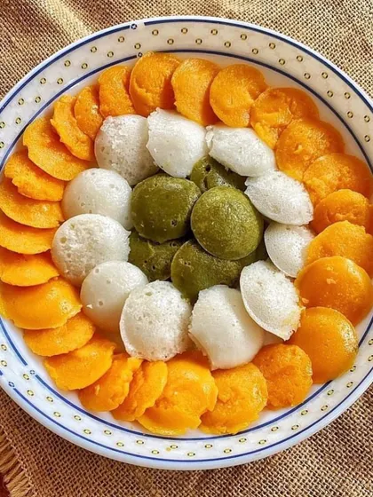 Tricolor idlis made with natural coloring from carrots and spinach. A festive and healthy way to enjoy a South Indian classic.