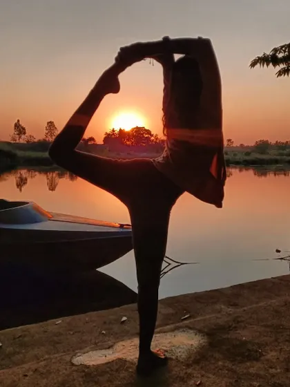 Striking a Natarajasana (Dancer Pose) silhouette against the sunrise. These are the moments of peace and presence I cherish and aim to create for everyone at my getaways.