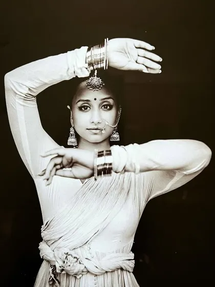 A sepia-toned portrait inspired by the history of courtesan dancers. This shoot was about time-traveling through the aesthetics of another era.