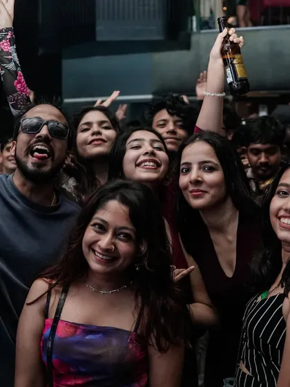 A duplicate of the group with the beer. Cheers to unforgettable nights.