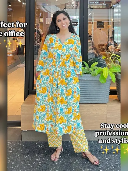 Stay cool, professional, and stylish all day long. This yellow and blue floral kurta-pant co-ord set is perfect for the office in the summer.