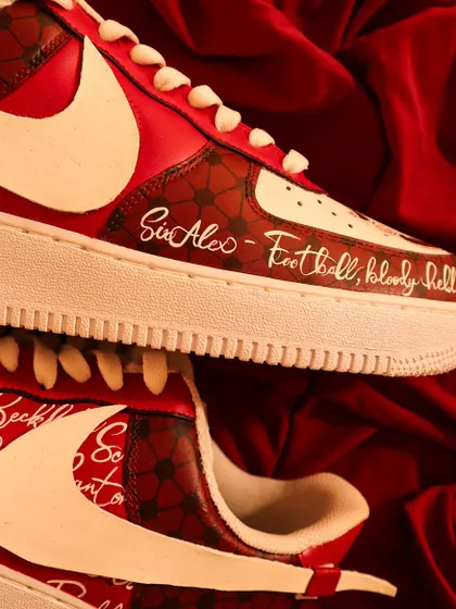 I added some famous quotes and names from Manchester United's history to the side of the sneakers, including Sir Alex Ferguson's classic line, "Football, bloody hell."