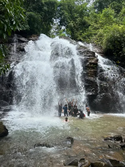 A group of trekkers celebrating their successful journey to this beautiful waterfall in Uttara Kannada. The energy and happiness are contagious.