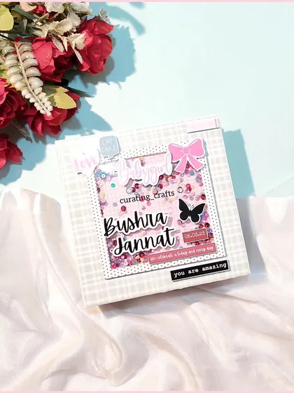 A baby record book in the form of a mini scrapbook. I designed this for a baby's first birthday to treasure all her precious memories and milestones.