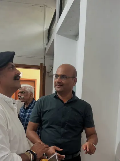 A candid shot with Shri Ajay Purkar as we discuss the artworks on display.