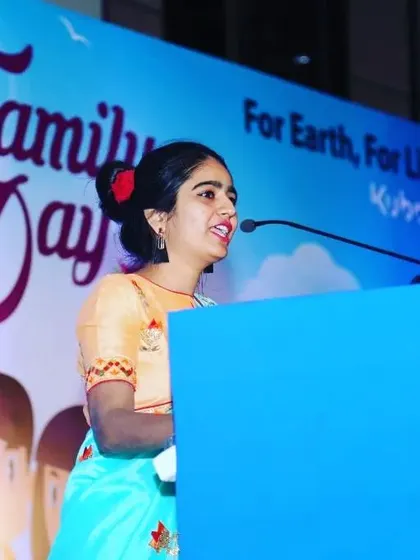 On stage at the Kubota Family Day event. Addressing the employees and their families requires a warm and welcoming presence. My aim is to make everyone feel like part of one big corporate family for the day.