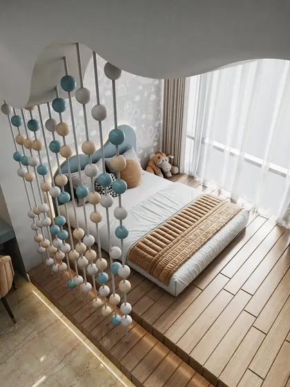 An overhead 3D view of the kid's room, showing the playful partition, the cozy bed, and the integrated study nook with superhero-themed decor.