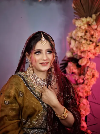 A close-up from our bridal campaign. The soft lighting and the model's gentle expression create a truly mesmerizing portrait.