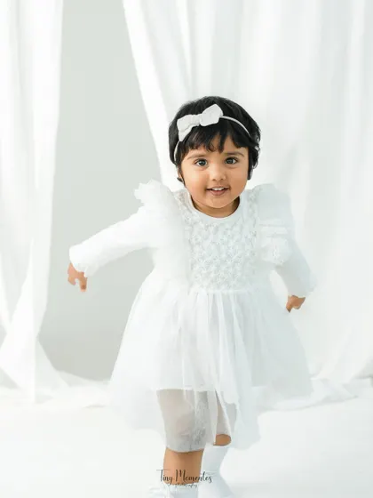 An angelic moment with this two-year-old. My minimalist portraits use soft, natural light to create timeless images that feel both elegant and pure.